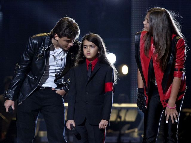 Michael Forever Tribute Concert Lovely Moment on Stage at Millennium Stadium in Cardiff Wales UK - A lovely moment on stage with the children of the late King of Pop Michael Jackson, Prince Michael, Prince Michael II (a.k.a. Blanket), who seems quite confused and their sister Paris, during the tribute concert 'Michael Forever' at the Millennium Stadium in Cardiff, the capital of Wales in UK (October 8, 2011). - , Michael, Forever, tribute, concert, concerts, lovely, moment, moments, stage, stages, Millennium, Stadium, stadiums, Cardiff, Wales, UK, music, musics, celebrities, celebrity, place, places, travel, travels, trip, trips, tour, tours, children, child, late, king, kings, pop, Jackson, Prince, Blanket, quite, confused, sister, sisters, Paris, capital, capitals, 2011 - A lovely moment on stage with the children of the late King of Pop Michael Jackson, Prince Michael, Prince Michael II (a.k.a. Blanket), who seems quite confused and their sister Paris, during the tribute concert 'Michael Forever' at the Millennium Stadium in Cardiff, the capital of Wales in UK (October 8, 2011). Подреждайте безплатни онлайн Michael Forever Tribute Concert Lovely Moment on Stage at Millennium Stadium in Cardiff Wales UK пъзел игри или изпратете Michael Forever Tribute Concert Lovely Moment on Stage at Millennium Stadium in Cardiff Wales UK пъзел игра поздравителна картичка  от puzzles-games.eu.. Michael Forever Tribute Concert Lovely Moment on Stage at Millennium Stadium in Cardiff Wales UK пъзел, пъзели, пъзели игри, puzzles-games.eu, пъзел игри, online пъзел игри, free пъзел игри, free online пъзел игри, Michael Forever Tribute Concert Lovely Moment on Stage at Millennium Stadium in Cardiff Wales UK free пъзел игра, Michael Forever Tribute Concert Lovely Moment on Stage at Millennium Stadium in Cardiff Wales UK online пъзел игра, jigsaw puzzles, Michael Forever Tribute Concert Lovely Moment on Stage at Millennium Stadium in Cardiff Wales UK jigsaw puzzle, jigsaw puzzle games, jigsaw puzzles games, Michael Forever Tribute Concert Lovely Moment on Stage at Millennium Stadium in Cardiff Wales UK пъзел игра картичка, пъзели игри картички, Michael Forever Tribute Concert Lovely Moment on Stage at Millennium Stadium in Cardiff Wales UK пъзел игра поздравителна картичка
