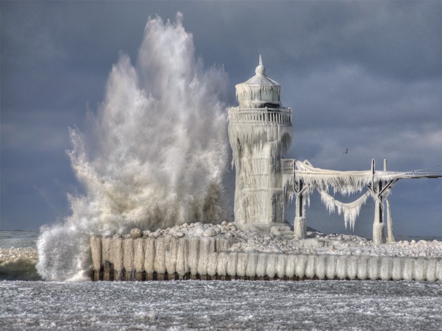 Lighthouse on Lake Michigan in Winter - During winter the icy waves crash to the pier of lighthouse on Lake Michigan and frost it. As a result, the amazing ice formations cover the lighthouse and look like from a magical fantastical fairytale. On the St. Joseph pier there were built over a century ago two lighthouses (10.5 m and 17.4 m tall), which stand guard under the onslaught of the powerful spray. - , lighthouse, lighthouses, lake, lakes, Michigan, winter, nature, natures, icy, waves, wave, pier, piers, result, results, amazing, ice, formations, formation, magical, fantastical, fairytale, fairytales, St., saint, Joseph, century, guard, guards, onslaught, powerful, spray - During winter the icy waves crash to the pier of lighthouse on Lake Michigan and frost it. As a result, the amazing ice formations cover the lighthouse and look like from a magical fantastical fairytale. On the St. Joseph pier there were built over a century ago two lighthouses (10.5 m and 17.4 m tall), which stand guard under the onslaught of the powerful spray. Lösen Sie kostenlose Lighthouse on Lake Michigan in Winter Online Puzzle Spiele oder senden Sie Lighthouse on Lake Michigan in Winter Puzzle Spiel Gruß ecards  from puzzles-games.eu.. Lighthouse on Lake Michigan in Winter puzzle, Rätsel, puzzles, Puzzle Spiele, puzzles-games.eu, puzzle games, Online Puzzle Spiele, kostenlose Puzzle Spiele, kostenlose Online Puzzle Spiele, Lighthouse on Lake Michigan in Winter kostenlose Puzzle Spiel, Lighthouse on Lake Michigan in Winter Online Puzzle Spiel, jigsaw puzzles, Lighthouse on Lake Michigan in Winter jigsaw puzzle, jigsaw puzzle games, jigsaw puzzles games, Lighthouse on Lake Michigan in Winter Puzzle Spiel ecard, Puzzles Spiele ecards, Lighthouse on Lake Michigan in Winter Puzzle Spiel Gruß ecards