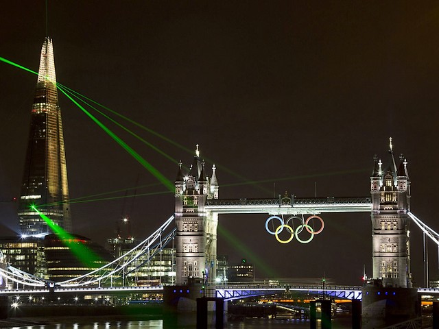 2012 Summer Olympics Tower Bridge illuminated by The Shard Lasers  London UK - Gothic architecture of 'Tower Bridge' over the river Thames illuminated by the lasers from the hi-tech tower of 'The Shard', designed by the Italian architect Renzo Piano with an irregular pyramidal shape and clad entirely in glass, a new iconic monument in London and the tallest building in Western Europe (309.6 meters), during the Summer Olympics in UK (July-August 2012). - , 2012, Summer, Olympics, Tower, towers, Bridge, bridges, Shard, lasers, laser, London, UK, places, place, show, shows, sport, sports, travel, travels, tour, tours, trip, trips, gothic, architecture, architectures, river, rivers, Thames, hi-tech, Italian, architect, architects, Renzo, Piano, irregular, pyramidal, shape, shapes, glass, iconic, monument, monuments, tallest, building, buildings, Western, Europe, 309.6, meters, meter, July, August - Gothic architecture of 'Tower Bridge' over the river Thames illuminated by the lasers from the hi-tech tower of 'The Shard', designed by the Italian architect Renzo Piano with an irregular pyramidal shape and clad entirely in glass, a new iconic monument in London and the tallest building in Western Europe (309.6 meters), during the Summer Olympics in UK (July-August 2012). Подреждайте безплатни онлайн 2012 Summer Olympics Tower Bridge illuminated by The Shard Lasers  London UK пъзел игри или изпратете 2012 Summer Olympics Tower Bridge illuminated by The Shard Lasers  London UK пъзел игра поздравителна картичка  от puzzles-games.eu.. 2012 Summer Olympics Tower Bridge illuminated by The Shard Lasers  London UK пъзел, пъзели, пъзели игри, puzzles-games.eu, пъзел игри, online пъзел игри, free пъзел игри, free online пъзел игри, 2012 Summer Olympics Tower Bridge illuminated by The Shard Lasers  London UK free пъзел игра, 2012 Summer Olympics Tower Bridge illuminated by The Shard Lasers  London UK online пъзел игра, jigsaw puzzles, 2012 Summer Olympics Tower Bridge illuminated by The Shard Lasers  London UK jigsaw puzzle, jigsaw puzzle games, jigsaw puzzles games, 2012 Summer Olympics Tower Bridge illuminated by The Shard Lasers  London UK пъзел игра картичка, пъзели игри картички, 2012 Summer Olympics Tower Bridge illuminated by The Shard Lasers  London UK пъзел игра поздравителна картичка