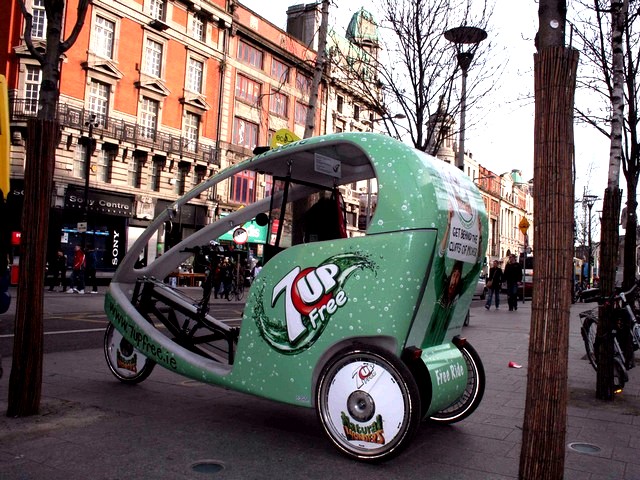 Eco Cab on OConnell Street - An Eco Cab on O'Connell Street in Dublin, Ireland. In 2004 the Eco Cab is used as an official transport at the Olimpic Games in Athens and at the World Cup in Germany (2006). - , Eco, Cab, cabs, OConnell, street, streets, bikes, bike, bicycle, bicycles, motor, cycle, cycles, roadster, roadsters, motorcycle, motorcycles, wheels, Olimpic, Games, Athens, World, Cup, Germany - An Eco Cab on O'Connell Street in Dublin, Ireland. In 2004 the Eco Cab is used as an official transport at the Olimpic Games in Athens and at the World Cup in Germany (2006). Resuelve rompecabezas en línea gratis Eco Cab on OConnell Street juegos puzzle o enviar Eco Cab on OConnell Street juego de puzzle tarjetas electrónicas de felicitación  de puzzles-games.eu.. Eco Cab on OConnell Street puzzle, puzzles, rompecabezas juegos, puzzles-games.eu, juegos de puzzle, juegos en línea del rompecabezas, juegos gratis puzzle, juegos en línea gratis rompecabezas, Eco Cab on OConnell Street juego de puzzle gratuito, Eco Cab on OConnell Street juego de rompecabezas en línea, jigsaw puzzles, Eco Cab on OConnell Street jigsaw puzzle, jigsaw puzzle games, jigsaw puzzles games, Eco Cab on OConnell Street rompecabezas de juego tarjeta electrónica, juegos de puzzles tarjetas electrónicas, Eco Cab on OConnell Street puzzle tarjeta electrónica de felicitación