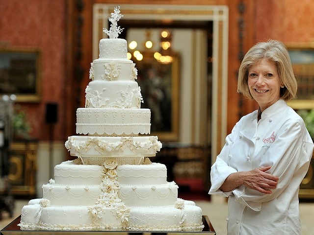 Royal Wedding Cake Designer Fiona Cairns in Picture Gallery of Buckingham Palace London England - Designer Fiona Cairns, stands near the royal wedding cake, made for Prince William, Duke of Cambridge and his wife Catherine, Duchess of Cambridge, for their wedding reception in Picture Gallery of Buckingham Palace, London, England, at the afternoon on April 29, 2011. - , Royal, wedding, weddings, cake, cakes, designer, designers, Fiona, Cairns, Picture, Gallery, galleries, Buckingham, palace, palaces, London, England, food, foods, celebrities, celebrity, show, shows, ceremony, ceremonies, event, events, entertainment, entertainments, place, places, travel, travels, tour, tours, prince, princes, William, duke, dukes, Cambridge, wife, wifes, Catherine, duchess, duchesses, reception, receptions, afternoon, afternoons, April, 2011 - Designer Fiona Cairns, stands near the royal wedding cake, made for Prince William, Duke of Cambridge and his wife Catherine, Duchess of Cambridge, for their wedding reception in Picture Gallery of Buckingham Palace, London, England, at the afternoon on April 29, 2011. Solve free online Royal Wedding Cake Designer Fiona Cairns in Picture Gallery of Buckingham Palace London England puzzle games or send Royal Wedding Cake Designer Fiona Cairns in Picture Gallery of Buckingham Palace London England puzzle game greeting ecards  from puzzles-games.eu.. Royal Wedding Cake Designer Fiona Cairns in Picture Gallery of Buckingham Palace London England puzzle, puzzles, puzzles games, puzzles-games.eu, puzzle games, online puzzle games, free puzzle games, free online puzzle games, Royal Wedding Cake Designer Fiona Cairns in Picture Gallery of Buckingham Palace London England free puzzle game, Royal Wedding Cake Designer Fiona Cairns in Picture Gallery of Buckingham Palace London England online puzzle game, jigsaw puzzles, Royal Wedding Cake Designer Fiona Cairns in Picture Gallery of Buckingham Palace London England jigsaw puzzle, jigsaw puzzle games, jigsaw puzzles games, Royal Wedding Cake Designer Fiona Cairns in Picture Gallery of Buckingham Palace London England puzzle game ecard, puzzles games ecards, Royal Wedding Cake Designer Fiona Cairns in Picture Gallery of Buckingham Palace London England puzzle game greeting ecard