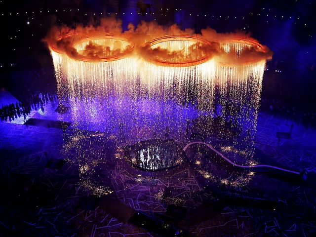 2012 Summer Olympics Opening Ceremony Olympic Rings London UK - Five Olympic rings illuminate the stadium in Stratford, east London, during the spectacular, breathtaking opening ceremony of the XXX Summer Olympics in the UK (July 27, 2012). The Olympic rings, seemingly made from molten steel in a shower of sparks, were lifted by giant balloons into space with an attached camera, to obtain pictures at the end of the night. - , 2012, Summer, Olympics, opening, ceremony, ceremonies, olympic, rings, ring, London, UK, show, shows, sport, sports, places, place, travel, travels, tour, tours, trip, trips, stadium, stadiums, Stratford, east, spectacular, breathtaking, XXX, July, molten, steel, shower, showers, sparks, spark, giant, balloons, balloon, space, camera, cameras, pictures, picture, night, nights - Five Olympic rings illuminate the stadium in Stratford, east London, during the spectacular, breathtaking opening ceremony of the XXX Summer Olympics in the UK (July 27, 2012). The Olympic rings, seemingly made from molten steel in a shower of sparks, were lifted by giant balloons into space with an attached camera, to obtain pictures at the end of the night. Подреждайте безплатни онлайн 2012 Summer Olympics Opening Ceremony Olympic Rings London UK пъзел игри или изпратете 2012 Summer Olympics Opening Ceremony Olympic Rings London UK пъзел игра поздравителна картичка  от puzzles-games.eu.. 2012 Summer Olympics Opening Ceremony Olympic Rings London UK пъзел, пъзели, пъзели игри, puzzles-games.eu, пъзел игри, online пъзел игри, free пъзел игри, free online пъзел игри, 2012 Summer Olympics Opening Ceremony Olympic Rings London UK free пъзел игра, 2012 Summer Olympics Opening Ceremony Olympic Rings London UK online пъзел игра, jigsaw puzzles, 2012 Summer Olympics Opening Ceremony Olympic Rings London UK jigsaw puzzle, jigsaw puzzle games, jigsaw puzzles games, 2012 Summer Olympics Opening Ceremony Olympic Rings London UK пъзел игра картичка, пъзели игри картички, 2012 Summer Olympics Opening Ceremony Olympic Rings London UK пъзел игра поздравителна картичка