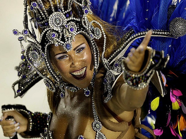 Rio Carnival Brazil 2011 Dancer from Portela Samba School - Dancer from the 'Portela' samba school, performs during the carnival parade on the Sambadrome in Rio de Janeiro, Brazil (March 7, 2011). - , Rio, carnival, carnivals, Brazil, 2011, dancer, dancers, Portela, samba, school, schools, show, shows, place, places, celebrations, celebration, festival, festivals, feast, amusement, amusements, holidays, holiday, places, place, travel, travels, tour, tours, trips, trip, parade, parades, Sambadrome, Janeiro, March - Dancer from the 'Portela' samba school, performs during the carnival parade on the Sambadrome in Rio de Janeiro, Brazil (March 7, 2011). Solve free online Rio Carnival Brazil 2011 Dancer from Portela Samba School puzzle games or send Rio Carnival Brazil 2011 Dancer from Portela Samba School puzzle game greeting ecards  from puzzles-games.eu.. Rio Carnival Brazil 2011 Dancer from Portela Samba School puzzle, puzzles, puzzles games, puzzles-games.eu, puzzle games, online puzzle games, free puzzle games, free online puzzle games, Rio Carnival Brazil 2011 Dancer from Portela Samba School free puzzle game, Rio Carnival Brazil 2011 Dancer from Portela Samba School online puzzle game, jigsaw puzzles, Rio Carnival Brazil 2011 Dancer from Portela Samba School jigsaw puzzle, jigsaw puzzle games, jigsaw puzzles games, Rio Carnival Brazil 2011 Dancer from Portela Samba School puzzle game ecard, puzzles games ecards, Rio Carnival Brazil 2011 Dancer from Portela Samba School puzzle game greeting ecard