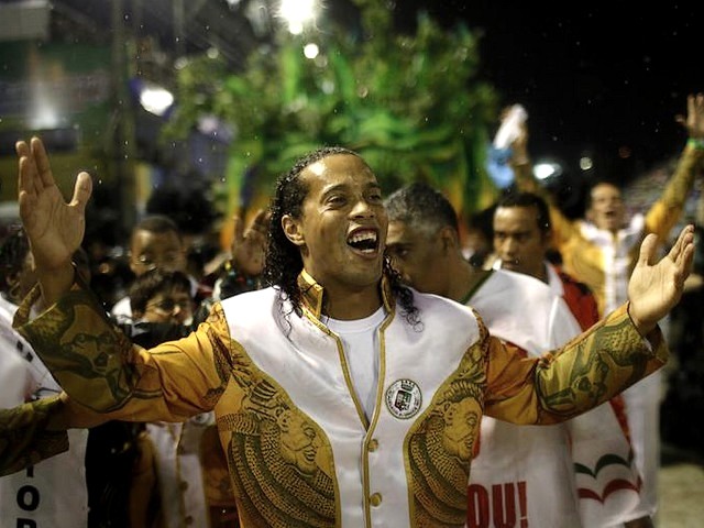 Rio Carnival Brazil 2011 Ronaldinho with Grande Rio Samba School - Ronaldinho, considered as one of the most talented players in the world, with the 'Grande Rio' samba school, during the carnival parade at the Sambadrome in Rio de Janeiro, Brazil (March 8, 2011). - , Rio, carnival, carnivals, Brazil, 2011, Ronaldinho, Grande, samba, school, schools, show, shows, place, places, celebrations, celebration, festival, festivals, feast, amusement, amusements, holidays, holiday, places, place, travel, travels, tour, tours, trips, trip, talented, players, player, world, worlds, parade, parades, Sambadrome, Janeiro, March - Ronaldinho, considered as one of the most talented players in the world, with the 'Grande Rio' samba school, during the carnival parade at the Sambadrome in Rio de Janeiro, Brazil (March 8, 2011). Lösen Sie kostenlose Rio Carnival Brazil 2011 Ronaldinho with Grande Rio Samba School Online Puzzle Spiele oder senden Sie Rio Carnival Brazil 2011 Ronaldinho with Grande Rio Samba School Puzzle Spiel Gruß ecards  from puzzles-games.eu.. Rio Carnival Brazil 2011 Ronaldinho with Grande Rio Samba School puzzle, Rätsel, puzzles, Puzzle Spiele, puzzles-games.eu, puzzle games, Online Puzzle Spiele, kostenlose Puzzle Spiele, kostenlose Online Puzzle Spiele, Rio Carnival Brazil 2011 Ronaldinho with Grande Rio Samba School kostenlose Puzzle Spiel, Rio Carnival Brazil 2011 Ronaldinho with Grande Rio Samba School Online Puzzle Spiel, jigsaw puzzles, Rio Carnival Brazil 2011 Ronaldinho with Grande Rio Samba School jigsaw puzzle, jigsaw puzzle games, jigsaw puzzles games, Rio Carnival Brazil 2011 Ronaldinho with Grande Rio Samba School Puzzle Spiel ecard, Puzzles Spiele ecards, Rio Carnival Brazil 2011 Ronaldinho with Grande Rio Samba School Puzzle Spiel Gruß ecards
