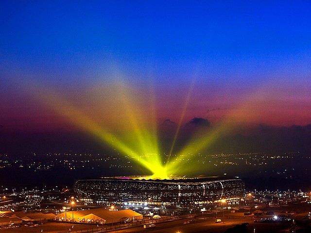 World Cup 2010 Closing Ceremony Lights Beams from Soccer City Stadium - Lights beams spew out from the Soccer City stadium during the FIFA World Cup 2010 Closing Ceremony in Johannesburg, South Africa (July 11, 2010). - , World, Cup, 2010, Closing, Ceremony, lights, light, beams, beam, Soccer, City, stadium, stadiums, show, shows, performance, performances, celebration, celebrations, sport, sports, tournament, tournaments, FIFA, Johannesburg, South, Africa - Lights beams spew out from the Soccer City stadium during the FIFA World Cup 2010 Closing Ceremony in Johannesburg, South Africa (July 11, 2010). Lösen Sie kostenlose World Cup 2010 Closing Ceremony Lights Beams from Soccer City Stadium Online Puzzle Spiele oder senden Sie World Cup 2010 Closing Ceremony Lights Beams from Soccer City Stadium Puzzle Spiel Gruß ecards  from puzzles-games.eu.. World Cup 2010 Closing Ceremony Lights Beams from Soccer City Stadium puzzle, Rätsel, puzzles, Puzzle Spiele, puzzles-games.eu, puzzle games, Online Puzzle Spiele, kostenlose Puzzle Spiele, kostenlose Online Puzzle Spiele, World Cup 2010 Closing Ceremony Lights Beams from Soccer City Stadium kostenlose Puzzle Spiel, World Cup 2010 Closing Ceremony Lights Beams from Soccer City Stadium Online Puzzle Spiel, jigsaw puzzles, World Cup 2010 Closing Ceremony Lights Beams from Soccer City Stadium jigsaw puzzle, jigsaw puzzle games, jigsaw puzzles games, World Cup 2010 Closing Ceremony Lights Beams from Soccer City Stadium Puzzle Spiel ecard, Puzzles Spiele ecards, World Cup 2010 Closing Ceremony Lights Beams from Soccer City Stadium Puzzle Spiel Gruß ecards