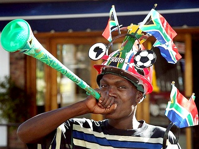 World Cup 2010 Fan with Accoutrements - A fan from South Africa with full accoutrements as Vuvuzela horn and Makarapa helmet during the 2010 FIFA World Cup 2010. - , World, Cup, 2010, fan, fans, accoutrementsaccoutrement, show, shows, performance, performances, sport, sports, tournament, tournaments, qualification, qualifications, ceremony, ceremonies, match, matches, South, Africa, Vuvuzela, horn, horns, Makarapa, helmet, helmets, FIFA - A fan from South Africa with full accoutrements as Vuvuzela horn and Makarapa helmet during the 2010 FIFA World Cup 2010. Решайте бесплатные онлайн World Cup 2010 Fan with Accoutrements пазлы игры или отправьте World Cup 2010 Fan with Accoutrements пазл игру приветственную открытку  из puzzles-games.eu.. World Cup 2010 Fan with Accoutrements пазл, пазлы, пазлы игры, puzzles-games.eu, пазл игры, онлайн пазл игры, игры пазлы бесплатно, бесплатно онлайн пазл игры, World Cup 2010 Fan with Accoutrements бесплатно пазл игра, World Cup 2010 Fan with Accoutrements онлайн пазл игра , jigsaw puzzles, World Cup 2010 Fan with Accoutrements jigsaw puzzle, jigsaw puzzle games, jigsaw puzzles games, World Cup 2010 Fan with Accoutrements пазл игра открытка, пазлы игры открытки, World Cup 2010 Fan with Accoutrements пазл игра приветственная открытка