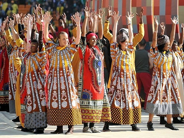 World Cup 2010 Traditional Costumes - Peformers in traditional costumes dance during the Opening ceremony of the FIFA World Cup 2010 at the Soccer City stadium in Johannesburg, South Africa (June 11, 2010). - , World, Cup, 2010, traditional, costumes, costume, show, shows, performance, performances, sport, sports, tournament, tournaments, qualification, qualifications, ceremony, ceremonies, match, matches, performers, performer, Opening, FIFA, Soccer, City, stadium, stadiums, Johannesburg, South, Africa - Peformers in traditional costumes dance during the Opening ceremony of the FIFA World Cup 2010 at the Soccer City stadium in Johannesburg, South Africa (June 11, 2010). Решайте бесплатные онлайн World Cup 2010 Traditional Costumes пазлы игры или отправьте World Cup 2010 Traditional Costumes пазл игру приветственную открытку  из puzzles-games.eu.. World Cup 2010 Traditional Costumes пазл, пазлы, пазлы игры, puzzles-games.eu, пазл игры, онлайн пазл игры, игры пазлы бесплатно, бесплатно онлайн пазл игры, World Cup 2010 Traditional Costumes бесплатно пазл игра, World Cup 2010 Traditional Costumes онлайн пазл игра , jigsaw puzzles, World Cup 2010 Traditional Costumes jigsaw puzzle, jigsaw puzzle games, jigsaw puzzles games, World Cup 2010 Traditional Costumes пазл игра открытка, пазлы игры открытки, World Cup 2010 Traditional Costumes пазл игра приветственная открытка