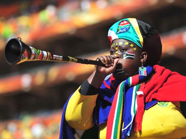 World Cup 2010 a South Africa Fan - A South Africa fan blows a Vuvuzela horn at the Soccer City stadium in Johannesburg, awating the Opening ceremony of the 2010 FIFA World Cup (June 11). - , World, Cup, 2010, South, Africa, fan, fans, show, shows, performance, performances, sport, sports, tournament, tournaments, qualification, qualification, ceremony, ceremonies, match, matches, Vuvuzela, horn, horns, Soccer, City, stadium, stadiums, Johannesburg, Opening, FIFA - A South Africa fan blows a Vuvuzela horn at the Soccer City stadium in Johannesburg, awating the Opening ceremony of the 2010 FIFA World Cup (June 11). Решайте бесплатные онлайн World Cup 2010 a South Africa Fan пазлы игры или отправьте World Cup 2010 a South Africa Fan пазл игру приветственную открытку  из puzzles-games.eu.. World Cup 2010 a South Africa Fan пазл, пазлы, пазлы игры, puzzles-games.eu, пазл игры, онлайн пазл игры, игры пазлы бесплатно, бесплатно онлайн пазл игры, World Cup 2010 a South Africa Fan бесплатно пазл игра, World Cup 2010 a South Africa Fan онлайн пазл игра , jigsaw puzzles, World Cup 2010 a South Africa Fan jigsaw puzzle, jigsaw puzzle games, jigsaw puzzles games, World Cup 2010 a South Africa Fan пазл игра открытка, пазлы игры открытки, World Cup 2010 a South Africa Fan пазл игра приветственная открытка