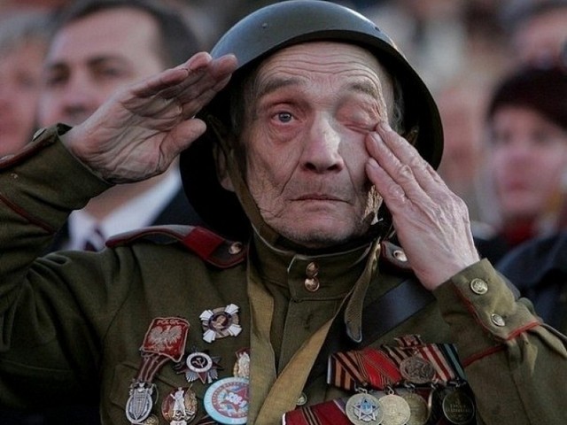 Victory Day Veteran of WWII - Veteran of WWII salutes during the parade for the Victory Day in Red Square in Moscow. On May 9, 2015, Russia celebrates the 70th anniversary of the victory over Nazi Germany and the end of World War Two in Europe. <br />
World War II that lasted from 1939 to 1945, was a global war, resulted in the death of over 70 million people. Tribute to the heroism and sacrifice of the people perished in the deadliest military conflict in human history. - , Victory, Day, days, veteran, veterans, WWII, holiday, holidays, parade, parades, Red, Square, squares, Moscow, May, 2015, Russia, 70th, anniversary, Nazi, Germany, end, World, War, Europe, 1939, 1945, global, death, million, people, tribute, heroism, sacrifice, deadliest, military, conflict, conflicts, human, history, histories - Veteran of WWII salutes during the parade for the Victory Day in Red Square in Moscow. On May 9, 2015, Russia celebrates the 70th anniversary of the victory over Nazi Germany and the end of World War Two in Europe. <br />
World War II that lasted from 1939 to 1945, was a global war, resulted in the death of over 70 million people. Tribute to the heroism and sacrifice of the people perished in the deadliest military conflict in human history. Подреждайте безплатни онлайн Victory Day Veteran of WWII пъзел игри или изпратете Victory Day Veteran of WWII пъзел игра поздравителна картичка  от puzzles-games.eu.. Victory Day Veteran of WWII пъзел, пъзели, пъзели игри, puzzles-games.eu, пъзел игри, online пъзел игри, free пъзел игри, free online пъзел игри, Victory Day Veteran of WWII free пъзел игра, Victory Day Veteran of WWII online пъзел игра, jigsaw puzzles, Victory Day Veteran of WWII jigsaw puzzle, jigsaw puzzle games, jigsaw puzzles games, Victory Day Veteran of WWII пъзел игра картичка, пъзели игри картички, Victory Day Veteran of WWII пъзел игра поздравителна картичка