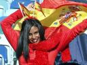World Cup 2010 Champion Fan waves the Spanish National Flag