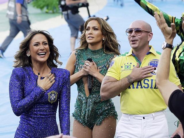 2014 FIFA World Cup Brazil Opening Ceremony Claudia Leitte, Jennifer Lopez and Pitbull - The Brazilian pop star Claudia Leitte, the American singer Jennifer Lopez and the Cuban-American rapper Pitbull, during the Opening ceremony of the 2014 FIFA World Cup, at the Itaquerao Stadium in Sao Paulo, Brazil (June 12, 2014). After the spirited show, the trio greeted the screaming crowds and almost tearful, Jennifer Lopez thanked them as touched her chest with her hand. - , 2014, FIFA, World, Cup, Brazil, Opening, Ceremony, ceremonies, Claudia, Leitte, Jennifer, Lopez, Pitbull, music, celebrities, celebrity, sport, sports, Brazilian, pop, star, stars, American, singer, singers, Cuban, rapper, rappers, Itaquerao, Stadium, stadiums, Sao, Paulo, June, spirited, show, trio, crowds, crowd, tearful, chest, hand, hands - The Brazilian pop star Claudia Leitte, the American singer Jennifer Lopez and the Cuban-American rapper Pitbull, during the Opening ceremony of the 2014 FIFA World Cup, at the Itaquerao Stadium in Sao Paulo, Brazil (June 12, 2014). After the spirited show, the trio greeted the screaming crowds and almost tearful, Jennifer Lopez thanked them as touched her chest with her hand. Solve free online 2014 FIFA World Cup Brazil Opening Ceremony Claudia Leitte, Jennifer Lopez and Pitbull puzzle games or send 2014 FIFA World Cup Brazil Opening Ceremony Claudia Leitte, Jennifer Lopez and Pitbull puzzle game greeting ecards  from puzzles-games.eu.. 2014 FIFA World Cup Brazil Opening Ceremony Claudia Leitte, Jennifer Lopez and Pitbull puzzle, puzzles, puzzles games, puzzles-games.eu, puzzle games, online puzzle games, free puzzle games, free online puzzle games, 2014 FIFA World Cup Brazil Opening Ceremony Claudia Leitte, Jennifer Lopez and Pitbull free puzzle game, 2014 FIFA World Cup Brazil Opening Ceremony Claudia Leitte, Jennifer Lopez and Pitbull online puzzle game, jigsaw puzzles, 2014 FIFA World Cup Brazil Opening Ceremony Claudia Leitte, Jennifer Lopez and Pitbull jigsaw puzzle, jigsaw puzzle games, jigsaw puzzles games, 2014 FIFA World Cup Brazil Opening Ceremony Claudia Leitte, Jennifer Lopez and Pitbull puzzle game ecard, puzzles games ecards, 2014 FIFA World Cup Brazil Opening Ceremony Claudia Leitte, Jennifer Lopez and Pitbull puzzle game greeting ecard