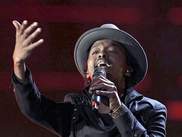 World Cup 2010 Kick-off Concert KNaan - The Somali-Canadian rapper K'Naan performs 'Wavin' Flag' the official soccer song of the FIFA World Cup 2010 and the 'Coca-Cola' Anthem during the Kick-off concert at the Orlando stadium in Soweto, Johannesburg, South Africa (June 10, 2010). - , World, Cup, 2010, Kick-off, concert, K'Naan, music, musics, performance, performances, party, parties, show, shows, celebration, celebrations, sport, sports, tournament, tournaments, Somali-Canadian, rapper, rappers, Wavin', Flag, official, soccer, song, songs, anthem, anthems, Orlando, stadium, stadiums, Soweto, Johannesburg, South, Africa - The Somali-Canadian rapper K'Naan performs 'Wavin' Flag' the official soccer song of the FIFA World Cup 2010 and the 'Coca-Cola' Anthem during the Kick-off concert at the Orlando stadium in Soweto, Johannesburg, South Africa (June 10, 2010). Подреждайте безплатни онлайн World Cup 2010 Kick-off Concert KNaan пъзел игри или изпратете World Cup 2010 Kick-off Concert KNaan пъзел игра поздравителна картичка  от puzzles-games.eu.. World Cup 2010 Kick-off Concert KNaan пъзел, пъзели, пъзели игри, puzzles-games.eu, пъзел игри, online пъзел игри, free пъзел игри, free online пъзел игри, World Cup 2010 Kick-off Concert KNaan free пъзел игра, World Cup 2010 Kick-off Concert KNaan online пъзел игра, jigsaw puzzles, World Cup 2010 Kick-off Concert KNaan jigsaw puzzle, jigsaw puzzle games, jigsaw puzzles games, World Cup 2010 Kick-off Concert KNaan пъзел игра картичка, пъзели игри картички, World Cup 2010 Kick-off Concert KNaan пъзел игра поздравителна картичка
