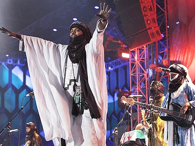 World Cup 2010 Kick-off Concert Tinariwen - The Tinariwen band of Tuareg from the Sahara Desert region of Northen Mali performs on stage during the Kick-off concert of the FIFA World Cup 2010 at the Orlando stadium in Soweto, Johannesburg, South Africa (June 10). - , World, Cup, 2010, Kick-off, concert, Tinariwen, music, musics, performance, performances, party, parties, show, shows, celebration, celebrations, sport, sports, tournament, tournaments, band, bands, Tuareg, Sahara, Desert, region, regions, Northen, Mali, FIFA, Orlando, stadium, stadiums, Soweto, Johannesburg, South, Africa - The Tinariwen band of Tuareg from the Sahara Desert region of Northen Mali performs on stage during the Kick-off concert of the FIFA World Cup 2010 at the Orlando stadium in Soweto, Johannesburg, South Africa (June 10). Lösen Sie kostenlose World Cup 2010 Kick-off Concert Tinariwen Online Puzzle Spiele oder senden Sie World Cup 2010 Kick-off Concert Tinariwen Puzzle Spiel Gruß ecards  from puzzles-games.eu.. World Cup 2010 Kick-off Concert Tinariwen puzzle, Rätsel, puzzles, Puzzle Spiele, puzzles-games.eu, puzzle games, Online Puzzle Spiele, kostenlose Puzzle Spiele, kostenlose Online Puzzle Spiele, World Cup 2010 Kick-off Concert Tinariwen kostenlose Puzzle Spiel, World Cup 2010 Kick-off Concert Tinariwen Online Puzzle Spiel, jigsaw puzzles, World Cup 2010 Kick-off Concert Tinariwen jigsaw puzzle, jigsaw puzzle games, jigsaw puzzles games, World Cup 2010 Kick-off Concert Tinariwen Puzzle Spiel ecard, Puzzles Spiele ecards, World Cup 2010 Kick-off Concert Tinariwen Puzzle Spiel Gruß ecards