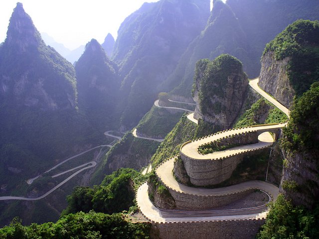 Avenue Towards Heaven Tianmen Mountain National Park Zhangjiajie Hunan China Wallpaper - Wallpaper with the scenic area of the 'Avenue Towards Heaven' (known as the Big Gate Road), one of the scariest road in the world, which is located within the Tianmen Mountain National Park, Zhangjiajie, in northwestern Hunan Province of China. The 'Avenue Towards Heaven', also called 'the road of the 99 turns', is a wonderful road that rises from 200 m to 1300 м above the sea level the Tianmen mountain, very near to the top. Its building was started in 1998 and was completed eight years later. - , avenue, avenues, Heaven, Tianmen, Mountain, mountains, National, Park, parks, Zhangjiajie, Hunan, China, wallpaper, wallpapers, nature, natures, places, place, travel, travels, tour, tours, trip, trips, scenic, area, areas, Big, Gate, gates, Road, roads, scariest, world, worlds, northwestern, province, provinces, road, roads, turns, turn, wonderful, sea, level, levels, top, tops, 1998, years, year - Wallpaper with the scenic area of the 'Avenue Towards Heaven' (known as the Big Gate Road), one of the scariest road in the world, which is located within the Tianmen Mountain National Park, Zhangjiajie, in northwestern Hunan Province of China. The 'Avenue Towards Heaven', also called 'the road of the 99 turns', is a wonderful road that rises from 200 m to 1300 м above the sea level the Tianmen mountain, very near to the top. Its building was started in 1998 and was completed eight years later. Lösen Sie kostenlose Avenue Towards Heaven Tianmen Mountain National Park Zhangjiajie Hunan China Wallpaper Online Puzzle Spiele oder senden Sie Avenue Towards Heaven Tianmen Mountain National Park Zhangjiajie Hunan China Wallpaper Puzzle Spiel Gruß ecards  from puzzles-games.eu.. Avenue Towards Heaven Tianmen Mountain National Park Zhangjiajie Hunan China Wallpaper puzzle, Rätsel, puzzles, Puzzle Spiele, puzzles-games.eu, puzzle games, Online Puzzle Spiele, kostenlose Puzzle Spiele, kostenlose Online Puzzle Spiele, Avenue Towards Heaven Tianmen Mountain National Park Zhangjiajie Hunan China Wallpaper kostenlose Puzzle Spiel, Avenue Towards Heaven Tianmen Mountain National Park Zhangjiajie Hunan China Wallpaper Online Puzzle Spiel, jigsaw puzzles, Avenue Towards Heaven Tianmen Mountain National Park Zhangjiajie Hunan China Wallpaper jigsaw puzzle, jigsaw puzzle games, jigsaw puzzles games, Avenue Towards Heaven Tianmen Mountain National Park Zhangjiajie Hunan China Wallpaper Puzzle Spiel ecard, Puzzles Spiele ecards, Avenue Towards Heaven Tianmen Mountain National Park Zhangjiajie Hunan China Wallpaper Puzzle Spiel Gruß ecards