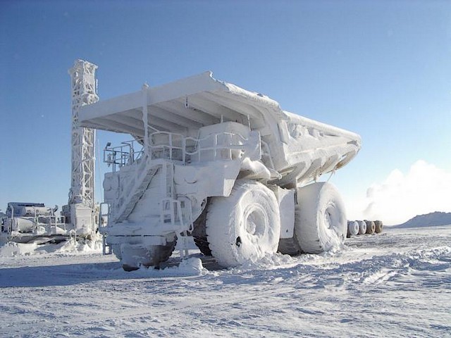 Haul Truck Ice Sculpture - This picture of the frost covered haul truck CAT 793 with 240 ton carrying capacity, that looks like an ice sculpture, was taken from Ekati Mine up North Canada, during a particularly bad winter blizzard in January of 2008, and first published on a blog post on July 9, 2008.<br />
The Ekati Diamond Mine is Canada's first surface and underground diamond mine, operated by Arctic Canadian Diamond. Officially it began production in October 1998, estimated to be able to supply diamonds for 25 years. <br />
Ekati diamond mine is located 200 km south of the Arctic Circle, near Lac de Gras in the Northwest Territories of Canada, about 300 kilometers northeast of Yellowknife. - , haul, truck, trucks, ice, sculpture, sculptures, nature, places, place, picture, pictures, frost, CAT, 793, 240, ton, Ekati, mine, North, Canada, winter, blizzard, January, 2008, diamond, Canada, surface, underground, diamond, Arctic, Canadian, Diamond, production, 1998, diamonds, circle, Northwest, Territories, northeast, Yellowknife - This picture of the frost covered haul truck CAT 793 with 240 ton carrying capacity, that looks like an ice sculpture, was taken from Ekati Mine up North Canada, during a particularly bad winter blizzard in January of 2008, and first published on a blog post on July 9, 2008.<br />
The Ekati Diamond Mine is Canada's first surface and underground diamond mine, operated by Arctic Canadian Diamond. Officially it began production in October 1998, estimated to be able to supply diamonds for 25 years. <br />
Ekati diamond mine is located 200 km south of the Arctic Circle, near Lac de Gras in the Northwest Territories of Canada, about 300 kilometers northeast of Yellowknife. Solve free online Haul Truck Ice Sculpture puzzle games or send Haul Truck Ice Sculpture puzzle game greeting ecards  from puzzles-games.eu.. Haul Truck Ice Sculpture puzzle, puzzles, puzzles games, puzzles-games.eu, puzzle games, online puzzle games, free puzzle games, free online puzzle games, Haul Truck Ice Sculpture free puzzle game, Haul Truck Ice Sculpture online puzzle game, jigsaw puzzles, Haul Truck Ice Sculpture jigsaw puzzle, jigsaw puzzle games, jigsaw puzzles games, Haul Truck Ice Sculpture puzzle game ecard, puzzles games ecards, Haul Truck Ice Sculpture puzzle game greeting ecard