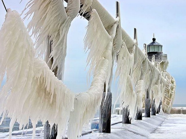 Ice Masterpiece of St.Joseph Lighthouse on Lake Michigan - If you visit in the winter the Lake Michigan, one of the Great Lakes in Canada, you can often see the special effects of the chilling ice masterpiece on the lighthouses, turned by the storm into enchanted towers and mythic castles.<br />
The photo of breathtaking image of the ice drapery formed by tons of ice on the drooping cables along the catwalk, on the St.Joseph lighthouse, during the winter storm, that created 20 foot waves churned up Lake Michigan, was taken by photographer Tom Gil  in the early winter of 2013. - , ice, masterpiece, St.Joseph, lighthouse, lake, Michigan, nature, Canada, winter, effects, chilling, storm, enchanted, towers, tower, mythic, castles, castle, photo, photos, breathtaking, image, images, drapery, cables, cable, catwalk, winter, storm, foot, waves, wave, photographer, photographers, Tom, Gil, 2013 - If you visit in the winter the Lake Michigan, one of the Great Lakes in Canada, you can often see the special effects of the chilling ice masterpiece on the lighthouses, turned by the storm into enchanted towers and mythic castles.<br />
The photo of breathtaking image of the ice drapery formed by tons of ice on the drooping cables along the catwalk, on the St.Joseph lighthouse, during the winter storm, that created 20 foot waves churned up Lake Michigan, was taken by photographer Tom Gil  in the early winter of 2013. Solve free online Ice Masterpiece of St.Joseph Lighthouse on Lake Michigan puzzle games or send Ice Masterpiece of St.Joseph Lighthouse on Lake Michigan puzzle game greeting ecards  from puzzles-games.eu.. Ice Masterpiece of St.Joseph Lighthouse on Lake Michigan puzzle, puzzles, puzzles games, puzzles-games.eu, puzzle games, online puzzle games, free puzzle games, free online puzzle games, Ice Masterpiece of St.Joseph Lighthouse on Lake Michigan free puzzle game, Ice Masterpiece of St.Joseph Lighthouse on Lake Michigan online puzzle game, jigsaw puzzles, Ice Masterpiece of St.Joseph Lighthouse on Lake Michigan jigsaw puzzle, jigsaw puzzle games, jigsaw puzzles games, Ice Masterpiece of St.Joseph Lighthouse on Lake Michigan puzzle game ecard, puzzles games ecards, Ice Masterpiece of St.Joseph Lighthouse on Lake Michigan puzzle game greeting ecard