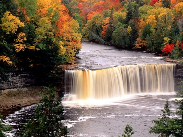 Upper Tahquamenon Falls Michigan USA Wallpaper - Wallpaper with an autumn landscape of the scenic waterfall 'Upper Tahquamenon Falls', located on the Tahquamenon River, at Luce County in the eastern Upper Peninsula of Michigan, USA, near Lake Superior, the largest of the five Great Lakes of North America. The 'Upper Tahquamenon Falls' is the third among most voluminous vertical waterfalls east of the Mississippi River, after 'Niagara Falls' and 'Cohoes Falls', more than 200 feet (60 m) wide and with a drop of approximately 48 feet (14 m). - , Upper, Tahquamenon, Falls, Michigan, USA, wallpaper, wallpapers, nature, natures, places, place, travel, travels, tour, tours, trip, trips, autumn, landscape, landscapes, scenic, waterfall, waterfalls, river, rivers, Luce, county, counties, eastern, Peninsula, Michigan, lake, lakes, Superior, great, North, America, voluminous, vertical, east, Mississippi, Niagara, Cohoes, drop, drops - Wallpaper with an autumn landscape of the scenic waterfall 'Upper Tahquamenon Falls', located on the Tahquamenon River, at Luce County in the eastern Upper Peninsula of Michigan, USA, near Lake Superior, the largest of the five Great Lakes of North America. The 'Upper Tahquamenon Falls' is the third among most voluminous vertical waterfalls east of the Mississippi River, after 'Niagara Falls' and 'Cohoes Falls', more than 200 feet (60 m) wide and with a drop of approximately 48 feet (14 m). Solve free online Upper Tahquamenon Falls Michigan USA Wallpaper puzzle games or send Upper Tahquamenon Falls Michigan USA Wallpaper puzzle game greeting ecards  from puzzles-games.eu.. Upper Tahquamenon Falls Michigan USA Wallpaper puzzle, puzzles, puzzles games, puzzles-games.eu, puzzle games, online puzzle games, free puzzle games, free online puzzle games, Upper Tahquamenon Falls Michigan USA Wallpaper free puzzle game, Upper Tahquamenon Falls Michigan USA Wallpaper online puzzle game, jigsaw puzzles, Upper Tahquamenon Falls Michigan USA Wallpaper jigsaw puzzle, jigsaw puzzle games, jigsaw puzzles games, Upper Tahquamenon Falls Michigan USA Wallpaper puzzle game ecard, puzzles games ecards, Upper Tahquamenon Falls Michigan USA Wallpaper puzzle game greeting ecard