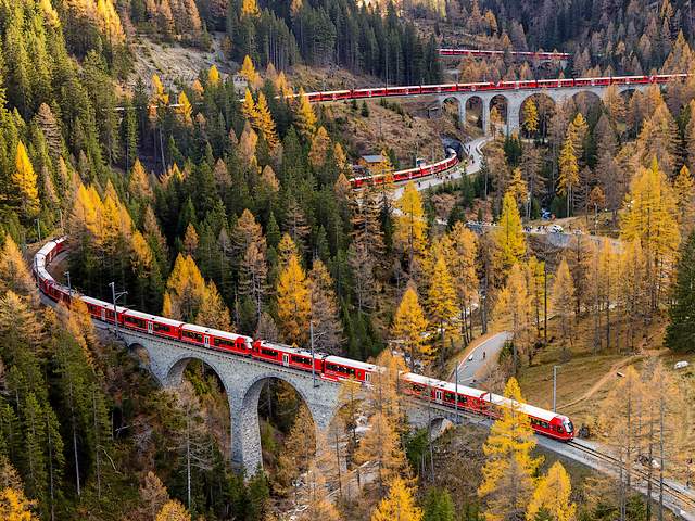 World Record for Longest Train Switzerland - The world record for the longest passenger train has been set on 29 October, 2022 by built  in Switzerland an almost 2-kilometer-long train (1,910m), as part of celebrations for the 175th anniversary of railways in the country.<br />
The journey for the world record has been organised by the Rhaetian Railway company, the first railway of Switzerland and took around an hour along the UNESCO World Heritage Albula/Bernina route from Preda to Alvaneu and over the Landwasser Viaduct.<br />
It’s regarded as one of the most spectacular train routes in the world thanks to amazing Alpine views, passing through scenic valleys, mountains, 22 tunnels, dozens of viaducts, 48 bridges and many picturesque quaint mountain towns.<br />
The train was composed by 25 electric trains connected each other, while each of them had four carriages making the total of 100 passenger coaches with 4,550 seats.<br />
The train was dismantled once the journey was completed into its separate parts and they will be used for regular traffic. - , world, record, records, longest, train, trains, Switzerland, nature, palace, places, show, shows, passenger, October, 2022, 1, 910m, part, celebrations, 175th, anniversary, railways, country, journey, Rhaetian, Railway, company, railway, UNESCO, World, Heritage, Albula/Bernina, route, routes, Preda, Alvaneu, Landwasser, Viaduct, spectacular, amazing, Alpine, views, scenic, valleys, mountains, tunnels, viaducts, bridges, picturesque, quaint, mountain, towns, electric, carriages, coaches, seats, separate, parts, regular, traffic - The world record for the longest passenger train has been set on 29 October, 2022 by built  in Switzerland an almost 2-kilometer-long train (1,910m), as part of celebrations for the 175th anniversary of railways in the country.<br />
The journey for the world record has been organised by the Rhaetian Railway company, the first railway of Switzerland and took around an hour along the UNESCO World Heritage Albula/Bernina route from Preda to Alvaneu and over the Landwasser Viaduct.<br />
It’s regarded as one of the most spectacular train routes in the world thanks to amazing Alpine views, passing through scenic valleys, mountains, 22 tunnels, dozens of viaducts, 48 bridges and many picturesque quaint mountain towns.<br />
The train was composed by 25 electric trains connected each other, while each of them had four carriages making the total of 100 passenger coaches with 4,550 seats.<br />
The train was dismantled once the journey was completed into its separate parts and they will be used for regular traffic. Lösen Sie kostenlose World Record for Longest Train Switzerland Online Puzzle Spiele oder senden Sie World Record for Longest Train Switzerland Puzzle Spiel Gruß ecards  from puzzles-games.eu.. World Record for Longest Train Switzerland puzzle, Rätsel, puzzles, Puzzle Spiele, puzzles-games.eu, puzzle games, Online Puzzle Spiele, kostenlose Puzzle Spiele, kostenlose Online Puzzle Spiele, World Record for Longest Train Switzerland kostenlose Puzzle Spiel, World Record for Longest Train Switzerland Online Puzzle Spiel, jigsaw puzzles, World Record for Longest Train Switzerland jigsaw puzzle, jigsaw puzzle games, jigsaw puzzles games, World Record for Longest Train Switzerland Puzzle Spiel ecard, Puzzles Spiele ecards, World Record for Longest Train Switzerland Puzzle Spiel Gruß ecards