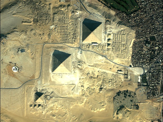 Great Pyramids of Giza Cairo Egypt Image by QuickBird Satellite Sensor - An image of the complex of ancient monuments with the Great Pyramids and the accompanying structures on the plateau of Giza, in the outskirts of Cairo, Egypt, made by the QuickBird Satellite sensor. If it is compared the location of the three Great Pyramids (of Cheops, Khafre and Menkaures), with the stars of Orion's belt in the night sky, it is seen that they are reflecting this celestial phenomenon. - , great, pyramids, pyramid, Giza, Cairo, Egypt, image, images, QuickBird, satellite, satellites, sensor, sensors, places, place, travel, travels, tour, tours, trip, trips, complex, complexes, ancient, monuments, monument, accompanying, structures, structure, plateau, plateaus, outskirts, outskirt, location, locations, Cheops, Khafre, Menkaure, stars, star, Orion, belt, belts, night, sky, skies, celestial, phenomenon, phenomena - An image of the complex of ancient monuments with the Great Pyramids and the accompanying structures on the plateau of Giza, in the outskirts of Cairo, Egypt, made by the QuickBird Satellite sensor. If it is compared the location of the three Great Pyramids (of Cheops, Khafre and Menkaures), with the stars of Orion's belt in the night sky, it is seen that they are reflecting this celestial phenomenon. Solve free online Great Pyramids of Giza Cairo Egypt Image by QuickBird Satellite Sensor puzzle games or send Great Pyramids of Giza Cairo Egypt Image by QuickBird Satellite Sensor puzzle game greeting ecards  from puzzles-games.eu.. Great Pyramids of Giza Cairo Egypt Image by QuickBird Satellite Sensor puzzle, puzzles, puzzles games, puzzles-games.eu, puzzle games, online puzzle games, free puzzle games, free online puzzle games, Great Pyramids of Giza Cairo Egypt Image by QuickBird Satellite Sensor free puzzle game, Great Pyramids of Giza Cairo Egypt Image by QuickBird Satellite Sensor online puzzle game, jigsaw puzzles, Great Pyramids of Giza Cairo Egypt Image by QuickBird Satellite Sensor jigsaw puzzle, jigsaw puzzle games, jigsaw puzzles games, Great Pyramids of Giza Cairo Egypt Image by QuickBird Satellite Sensor puzzle game ecard, puzzles games ecards, Great Pyramids of Giza Cairo Egypt Image by QuickBird Satellite Sensor puzzle game greeting ecard
