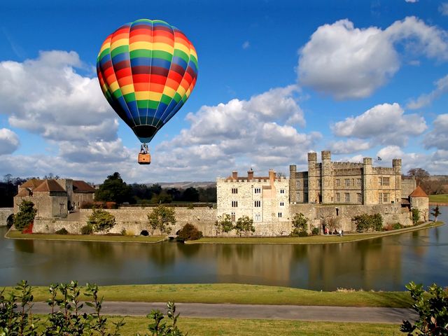 Hot Air Balloon over Leeds Castle Kent England - A flight with a hot air balloon which offers an exhilarating experience over the Leeds castle, one of the most romantic castles in England and the loveliest castle in the world. Leeds Castle is situated at the stunning countryside, set on two islands on the River Len, among 500 acres of beautiful parkland in the heart of Kent, England, 5 miles (8 km) southeast of Maidstone. It was built in 1119 by Henry VIII, as a home for Catherine of Aragon. The lake which surrounds the castle was created in 1278, when the castle became the property of King Edward I, to enhance its defences. Now it is open for entertaining guests with its 40 bedrooms, a 100-seater banquet hall, a maze, helipad and golf course, with a butler, chauffeur and chefs. - , hot, air, balloon, ballons, Leeds, castle, castles, Kent, England, places, place, travel, travels, tour, tours, trip, trips, exhilarating, experience, experiences, romantic, loveliest, world, worlds, stunning, countryside, countrysides, islands, island, river, rivers, Len, acres, acre, beautiful, parkland, parklands, heart, hearts, southeast, Maidstone, 1119, HenryVIII, home, homes, Catherine, Aragon, lake, lakes, 1278, property, properties, King, Edward, defences, defence, entertaining, guests, guest, bedrooms, bedroom, banquet, hall, halls, maze, mazes, helipad, helipads, golf, course, courses, butler, butlers, chauffeur, chauffeurs, chefs, chef - A flight with a hot air balloon which offers an exhilarating experience over the Leeds castle, one of the most romantic castles in England and the loveliest castle in the world. Leeds Castle is situated at the stunning countryside, set on two islands on the River Len, among 500 acres of beautiful parkland in the heart of Kent, England, 5 miles (8 km) southeast of Maidstone. It was built in 1119 by Henry VIII, as a home for Catherine of Aragon. The lake which surrounds the castle was created in 1278, when the castle became the property of King Edward I, to enhance its defences. Now it is open for entertaining guests with its 40 bedrooms, a 100-seater banquet hall, a maze, helipad and golf course, with a butler, chauffeur and chefs. Solve free online Hot Air Balloon over Leeds Castle Kent England puzzle games or send Hot Air Balloon over Leeds Castle Kent England puzzle game greeting ecards  from puzzles-games.eu.. Hot Air Balloon over Leeds Castle Kent England puzzle, puzzles, puzzles games, puzzles-games.eu, puzzle games, online puzzle games, free puzzle games, free online puzzle games, Hot Air Balloon over Leeds Castle Kent England free puzzle game, Hot Air Balloon over Leeds Castle Kent England online puzzle game, jigsaw puzzles, Hot Air Balloon over Leeds Castle Kent England jigsaw puzzle, jigsaw puzzle games, jigsaw puzzles games, Hot Air Balloon over Leeds Castle Kent England puzzle game ecard, puzzles games ecards, Hot Air Balloon over Leeds Castle Kent England puzzle game greeting ecard