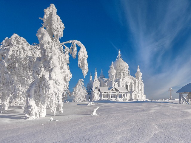 Snowy Belogorsky Monastery Perm  Russia - An Incredible photo of snowy Belogorsky Monastery in Perm, Russia. This church in the Urals looks amazing all year round, but it is majestic in winter. <br />
The history of the Belogorsky St. Nicholas monastery has roots in the so-called Otsu incident that happened to the future emperor Nicholas II in 1891. That year, the Grand Duke Nicholas paid an official visit to Japanese city of Otsu, where, he was attacked, but luckily, stayed safe. <br />
In honor of Nicholas’s II rescue, a ten-meter-tall cross was established on the Belaya Gora (White Mountain) in the Urals. Two years later was founded the monastery which was titled 'Belogorsky' after the mountain. - , snowy, Belogorsky, Monastery, Perm, Russia, place, places, nature, natures, Incredible, photo, photos, church, Urals, amazing, year, majestic, winter, history, St., Nicholas, roots, Otsu, incident, emperor, 1891, Grand, Duke, visit, Japanese, city, Otsu, honor, rescue, cross, Belaya, Gora, White, Mountain, Urals - An Incredible photo of snowy Belogorsky Monastery in Perm, Russia. This church in the Urals looks amazing all year round, but it is majestic in winter. <br />
The history of the Belogorsky St. Nicholas monastery has roots in the so-called Otsu incident that happened to the future emperor Nicholas II in 1891. That year, the Grand Duke Nicholas paid an official visit to Japanese city of Otsu, where, he was attacked, but luckily, stayed safe. <br />
In honor of Nicholas’s II rescue, a ten-meter-tall cross was established on the Belaya Gora (White Mountain) in the Urals. Two years later was founded the monastery which was titled 'Belogorsky' after the mountain. Решайте бесплатные онлайн Snowy Belogorsky Monastery Perm  Russia пазлы игры или отправьте Snowy Belogorsky Monastery Perm  Russia пазл игру приветственную открытку  из puzzles-games.eu.. Snowy Belogorsky Monastery Perm  Russia пазл, пазлы, пазлы игры, puzzles-games.eu, пазл игры, онлайн пазл игры, игры пазлы бесплатно, бесплатно онлайн пазл игры, Snowy Belogorsky Monastery Perm  Russia бесплатно пазл игра, Snowy Belogorsky Monastery Perm  Russia онлайн пазл игра , jigsaw puzzles, Snowy Belogorsky Monastery Perm  Russia jigsaw puzzle, jigsaw puzzle games, jigsaw puzzles games, Snowy Belogorsky Monastery Perm  Russia пазл игра открытка, пазлы игры открытки, Snowy Belogorsky Monastery Perm  Russia пазл игра приветственная открытка
