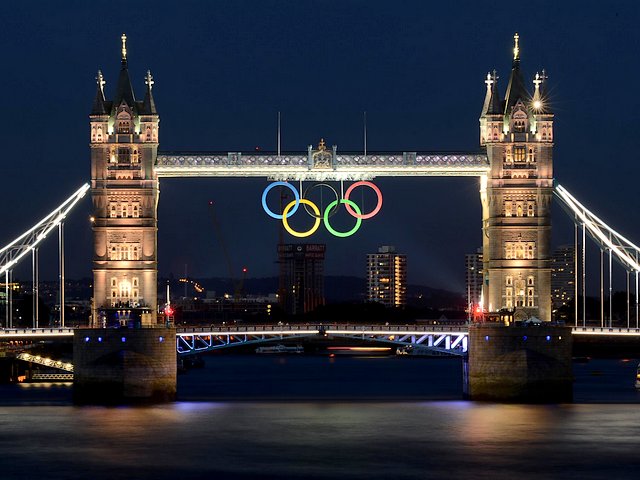 Tower Bridge and Olympic Rings glowing over the River Thames in London UK - The Tower Bridge, one of the most iconic landmarks in the capital of UK and the Olympic rings are glowing over the Thames River at the evening on July 23, 2012. The unveiling of the rings have coincided with one-month countdown until the 2012 London Olympics. The rings are 25 metres wide, 11.5 metres tall with weight of three tonnes. - , Tower, Bridge, bridges, Olympic, rings, ring, river, rivers, Thames, London, UK, places, place, show, shows, sport, sports, travel, travels, tour, tours, trip, trips, iconic, landmarks, landmark, capital, capitals, evening, evenings, July, 2012, unveiling, countdown, Olympics, metres, meter, wide, tall, weight, tonnes, tonne - The Tower Bridge, one of the most iconic landmarks in the capital of UK and the Olympic rings are glowing over the Thames River at the evening on July 23, 2012. The unveiling of the rings have coincided with one-month countdown until the 2012 London Olympics. The rings are 25 metres wide, 11.5 metres tall with weight of three tonnes. Lösen Sie kostenlose Tower Bridge and Olympic Rings glowing over the River Thames in London UK Online Puzzle Spiele oder senden Sie Tower Bridge and Olympic Rings glowing over the River Thames in London UK Puzzle Spiel Gruß ecards  from puzzles-games.eu.. Tower Bridge and Olympic Rings glowing over the River Thames in London UK puzzle, Rätsel, puzzles, Puzzle Spiele, puzzles-games.eu, puzzle games, Online Puzzle Spiele, kostenlose Puzzle Spiele, kostenlose Online Puzzle Spiele, Tower Bridge and Olympic Rings glowing over the River Thames in London UK kostenlose Puzzle Spiel, Tower Bridge and Olympic Rings glowing over the River Thames in London UK Online Puzzle Spiel, jigsaw puzzles, Tower Bridge and Olympic Rings glowing over the River Thames in London UK jigsaw puzzle, jigsaw puzzle games, jigsaw puzzles games, Tower Bridge and Olympic Rings glowing over the River Thames in London UK Puzzle Spiel ecard, Puzzles Spiele ecards, Tower Bridge and Olympic Rings glowing over the River Thames in London UK Puzzle Spiel Gruß ecards