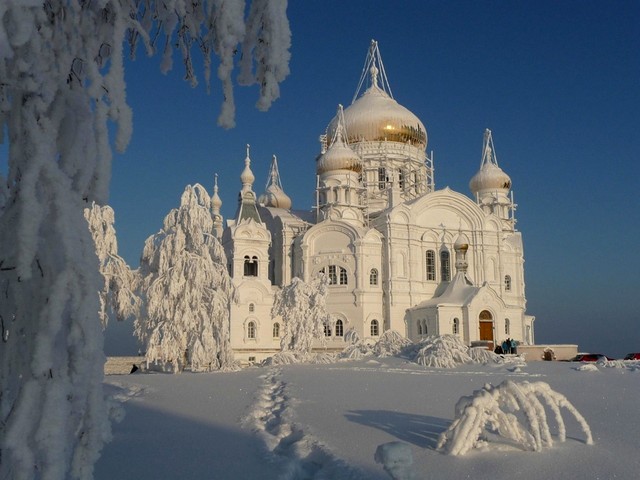 Winter Landscape of Belogorsky Monastery Perm Russia - A majestic winter landscape of the Belogorsky Monastery of St. Nicholas, with breathtaking snowy 'attire'. The Belogorsky Monastery, located on top of a hill in Belaya Gora (White Mountains), one of the main attractions of Perm region in Russia. The Belaya Gora Monastery is one of the most beautiful and the largest cathedral in the Ural region and the seventh largest church in Russia. <br />
The original wooden church and monastery were built in 1894. When the building burned down, construction of a new, two-story, stone church began in June 1902, as the monastery was completed in 1917. - , winter, landscape, landscapes, Belogorsky, Monastery, Perm, Russia, places, place, nature, natures, majestic, St.Nicholas, snowy, attire, hill, Belaya, Gora, White, Mountains, attractions, attraction, Perm, region, regions, Russia, beautiful, cathedral, Ural, church, churches, original, wooden, 1894, building, stone, church, 1902, 1917 - A majestic winter landscape of the Belogorsky Monastery of St. Nicholas, with breathtaking snowy 'attire'. The Belogorsky Monastery, located on top of a hill in Belaya Gora (White Mountains), one of the main attractions of Perm region in Russia. The Belaya Gora Monastery is one of the most beautiful and the largest cathedral in the Ural region and the seventh largest church in Russia. <br />
The original wooden church and monastery were built in 1894. When the building burned down, construction of a new, two-story, stone church began in June 1902, as the monastery was completed in 1917. Solve free online Winter Landscape of Belogorsky Monastery Perm Russia puzzle games or send Winter Landscape of Belogorsky Monastery Perm Russia puzzle game greeting ecards  from puzzles-games.eu.. Winter Landscape of Belogorsky Monastery Perm Russia puzzle, puzzles, puzzles games, puzzles-games.eu, puzzle games, online puzzle games, free puzzle games, free online puzzle games, Winter Landscape of Belogorsky Monastery Perm Russia free puzzle game, Winter Landscape of Belogorsky Monastery Perm Russia online puzzle game, jigsaw puzzles, Winter Landscape of Belogorsky Monastery Perm Russia jigsaw puzzle, jigsaw puzzle games, jigsaw puzzles games, Winter Landscape of Belogorsky Monastery Perm Russia puzzle game ecard, puzzles games ecards, Winter Landscape of Belogorsky Monastery Perm Russia puzzle game greeting ecard