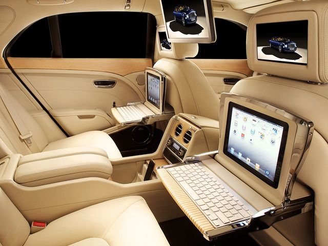 Bentley Mulsanne Executive Interior 2012 Geneva Auto Show - An executive interior in a luxurious, handcrafted cabin of Bentley Mulsanne, unveiled at the Geneva Auto Show (March 2012), with many high technologies, which are centralized in a comfortable mobile office, in assistance of executives while on the road. At the rear passenger area, there are three LCD screens, powered by an  Apple Mac computer mounted in the trunk, individual workstations Apple iPad with full internet access (integrated into fold-down tables), connected through Bluetooth keyboards. A large, centrally mounted, 15.6-inch high-def LED screen, which is suited for DVD and Television viewing, ensures a wide selection of movies. - , Bentley, Mulsanne, executive, interior, interiors, 2012, Geneva, auto, autos, show, shows, cars, car, automobiles, automobile, travel, travels, tour, tours, trip, trips, luxurious, handcrafted, cabin, cabins, March, high, technologies, technology, comfortable, mobile, office, offices, assistance, assistances, executives, road, roads, rear, passenger, area, areas, LCD, screens, screen, Apple, Mac, computer, computers, trunk, trunks, individual, workstations, workstation, iPad, internet, access, Bluetooth, keyboards, keyboard, DVD, television, selection, movies, movie - An executive interior in a luxurious, handcrafted cabin of Bentley Mulsanne, unveiled at the Geneva Auto Show (March 2012), with many high technologies, which are centralized in a comfortable mobile office, in assistance of executives while on the road. At the rear passenger area, there are three LCD screens, powered by an  Apple Mac computer mounted in the trunk, individual workstations Apple iPad with full internet access (integrated into fold-down tables), connected through Bluetooth keyboards. A large, centrally mounted, 15.6-inch high-def LED screen, which is suited for DVD and Television viewing, ensures a wide selection of movies. Solve free online Bentley Mulsanne Executive Interior 2012 Geneva Auto Show puzzle games or send Bentley Mulsanne Executive Interior 2012 Geneva Auto Show puzzle game greeting ecards  from puzzles-games.eu.. Bentley Mulsanne Executive Interior 2012 Geneva Auto Show puzzle, puzzles, puzzles games, puzzles-games.eu, puzzle games, online puzzle games, free puzzle games, free online puzzle games, Bentley Mulsanne Executive Interior 2012 Geneva Auto Show free puzzle game, Bentley Mulsanne Executive Interior 2012 Geneva Auto Show online puzzle game, jigsaw puzzles, Bentley Mulsanne Executive Interior 2012 Geneva Auto Show jigsaw puzzle, jigsaw puzzle games, jigsaw puzzles games, Bentley Mulsanne Executive Interior 2012 Geneva Auto Show puzzle game ecard, puzzles games ecards, Bentley Mulsanne Executive Interior 2012 Geneva Auto Show puzzle game greeting ecard