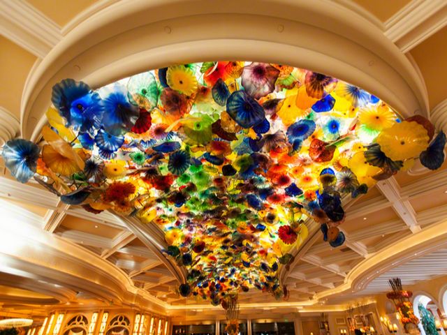 Glass Flower Ceiling Bellagio Hotel and Casino Las Vegas Nevada - An incredible ceiling in the lobby of the Bellagio Hotel and Casino in Las Vegas, Nevada with beautiful glass flowers (Fiori di Como, hand-blown glass flowers), an artwork masterpiece by sculptor Dale Chihuly. Dale Chihuly (born September 20, 1941) is an American glass sculptor and entrepreneur, whose works are considered unique to the field of blown glass. - , glass, flower, flowers, ceiling, ceilings, Bellagio, hotel, hotels, casino, Las, Vegas, Nevada, art, arts, places, place, incredible, lobby, beautiful, Fiori, Como, hand, blown, artwork, artworks, masterpiece, masterpieces, sculptor, sculptors, Dale, Chihuly, September, 1941, American, entrepreneur, entrepreneurs, works, work, unique, field, fields - An incredible ceiling in the lobby of the Bellagio Hotel and Casino in Las Vegas, Nevada with beautiful glass flowers (Fiori di Como, hand-blown glass flowers), an artwork masterpiece by sculptor Dale Chihuly. Dale Chihuly (born September 20, 1941) is an American glass sculptor and entrepreneur, whose works are considered unique to the field of blown glass. Solve free online Glass Flower Ceiling Bellagio Hotel and Casino Las Vegas Nevada puzzle games or send Glass Flower Ceiling Bellagio Hotel and Casino Las Vegas Nevada puzzle game greeting ecards  from puzzles-games.eu.. Glass Flower Ceiling Bellagio Hotel and Casino Las Vegas Nevada puzzle, puzzles, puzzles games, puzzles-games.eu, puzzle games, online puzzle games, free puzzle games, free online puzzle games, Glass Flower Ceiling Bellagio Hotel and Casino Las Vegas Nevada free puzzle game, Glass Flower Ceiling Bellagio Hotel and Casino Las Vegas Nevada online puzzle game, jigsaw puzzles, Glass Flower Ceiling Bellagio Hotel and Casino Las Vegas Nevada jigsaw puzzle, jigsaw puzzle games, jigsaw puzzles games, Glass Flower Ceiling Bellagio Hotel and Casino Las Vegas Nevada puzzle game ecard, puzzles games ecards, Glass Flower Ceiling Bellagio Hotel and Casino Las Vegas Nevada puzzle game greeting ecard