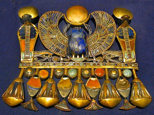Tutankhamun Winged Scarab Pectoral in Melbourne Museum Australia - Pectoral adornment in shape of winged scarab with semi-precious stones, one of the most admired jewelry, discovered in the tomb of the Egyptian pharaoh Tutankhamun, displayed in the Melbourne Museum during the exhibition 'Tutankhamun and the Golden Age of the Pharaohs', as a part of the '2011 Melbourne Winter Masterpieces' (April 8 to November 6, 2011). - , Tutankhamun, winged, scarab, scarabs, pectoral, pectorals, Melbourne, museum, museums, Australia, art, arts, places, place, travel, travels, trip, trips, tour, tours, adornment, adornments, shape, shapes, semi-precious, stones, stone, jewelry, jewel, tomb, tombs, Egyptian, pharaoh, pharaohs, exhibition, exhibitions, golden, age, ages, part, parts, 2011, winter, masterpieces, masterpiece, April, November - Pectoral adornment in shape of winged scarab with semi-precious stones, one of the most admired jewelry, discovered in the tomb of the Egyptian pharaoh Tutankhamun, displayed in the Melbourne Museum during the exhibition 'Tutankhamun and the Golden Age of the Pharaohs', as a part of the '2011 Melbourne Winter Masterpieces' (April 8 to November 6, 2011). Решайте бесплатные онлайн Tutankhamun Winged Scarab Pectoral in Melbourne Museum Australia пазлы игры или отправьте Tutankhamun Winged Scarab Pectoral in Melbourne Museum Australia пазл игру приветственную открытку  из puzzles-games.eu.. Tutankhamun Winged Scarab Pectoral in Melbourne Museum Australia пазл, пазлы, пазлы игры, puzzles-games.eu, пазл игры, онлайн пазл игры, игры пазлы бесплатно, бесплатно онлайн пазл игры, Tutankhamun Winged Scarab Pectoral in Melbourne Museum Australia бесплатно пазл игра, Tutankhamun Winged Scarab Pectoral in Melbourne Museum Australia онлайн пазл игра , jigsaw puzzles, Tutankhamun Winged Scarab Pectoral in Melbourne Museum Australia jigsaw puzzle, jigsaw puzzle games, jigsaw puzzles games, Tutankhamun Winged Scarab Pectoral in Melbourne Museum Australia пазл игра открытка, пазлы игры открытки, Tutankhamun Winged Scarab Pectoral in Melbourne Museum Australia пазл игра приветственная открытка