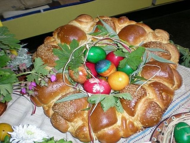 Easter Bread Bulgarian Kozunak - Festive table, decorated with Bulgarian Kozunak, dyed eggs and geranium. Kozunak is a traditional sweet bread for Easter in Bulgaria, made of white flour, yeast, milk, eggs, sugar, butter, vegetable oil, lemon zest, vanilla, ground coffee, raisins and almonds. Kozunak symbolises the body of Christ and usually two loaves are made, one is for the family and the other is left at the Church. - , Easter, bread, breads, Bulgarian, Kozunak, food, foods, holiday, holidays, festive, table, tables, dyed, eggs, egg, geranium, traditional, sweet, Bulgaria, white, flour, yeast, milk, sugar, butter, vegetable, oil, lemon, zest, vanilla, ground, coffee, raisins, almonds, body, Christ, loaves, loaf, family, families, church, churches - Festive table, decorated with Bulgarian Kozunak, dyed eggs and geranium. Kozunak is a traditional sweet bread for Easter in Bulgaria, made of white flour, yeast, milk, eggs, sugar, butter, vegetable oil, lemon zest, vanilla, ground coffee, raisins and almonds. Kozunak symbolises the body of Christ and usually two loaves are made, one is for the family and the other is left at the Church. Solve free online Easter Bread Bulgarian Kozunak puzzle games or send Easter Bread Bulgarian Kozunak puzzle game greeting ecards  from puzzles-games.eu.. Easter Bread Bulgarian Kozunak puzzle, puzzles, puzzles games, puzzles-games.eu, puzzle games, online puzzle games, free puzzle games, free online puzzle games, Easter Bread Bulgarian Kozunak free puzzle game, Easter Bread Bulgarian Kozunak online puzzle game, jigsaw puzzles, Easter Bread Bulgarian Kozunak jigsaw puzzle, jigsaw puzzle games, jigsaw puzzles games, Easter Bread Bulgarian Kozunak puzzle game ecard, puzzles games ecards, Easter Bread Bulgarian Kozunak puzzle game greeting ecard