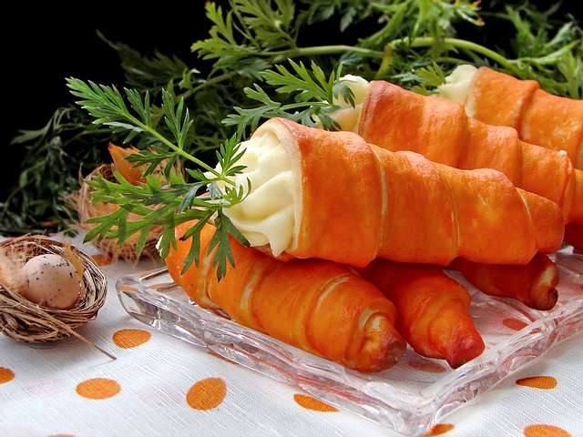 Easter Carrots - Original sweets for cup of coffee during the Easter feasts in shape of cones, filled with cream optional, from milk, vanilla, fruits or chocolate, which are decorated with fresh leaves of carrots. - , Easter, carrots, carrot, food, foods, holiday, holidays, feast, feasts, celebration, celebrations, original, sweets, sweet, cup, cups, coffee, shape, shapes, cones, cone, cream, creams, optional, milk, vanilla, fruit, fruits, chocolate, fresh, leaves, leaf, carrots, carrot - Original sweets for cup of coffee during the Easter feasts in shape of cones, filled with cream optional, from milk, vanilla, fruits or chocolate, which are decorated with fresh leaves of carrots. Solve free online Easter Carrots puzzle games or send Easter Carrots puzzle game greeting ecards  from puzzles-games.eu.. Easter Carrots puzzle, puzzles, puzzles games, puzzles-games.eu, puzzle games, online puzzle games, free puzzle games, free online puzzle games, Easter Carrots free puzzle game, Easter Carrots online puzzle game, jigsaw puzzles, Easter Carrots jigsaw puzzle, jigsaw puzzle games, jigsaw puzzles games, Easter Carrots puzzle game ecard, puzzles games ecards, Easter Carrots puzzle game greeting ecard