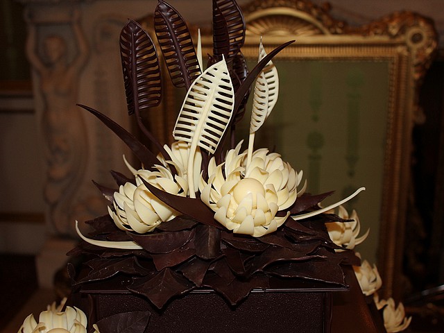 Royal Wedding Close-up of Chocolate Biscuit Cake by McVities for Guests in Buckingham Palace London England - Close-up on the top of a favorite chocolate biscuit cake from Prince William's childhood, an alternative to the traditional cake for guests on wedding reception in Buckingham Palace, London, England, at the afternoon on April 29, 2011. The cake was made by 'McVitie's Cake Company', according to an old recipe of the Royal Family from Rich Tea biscuits mixed with dark chocolate, covered in chocolate decoration in shape of flowers and leaves. - , Royal, wedding, weddings, close-up, chocolate, chocolates, biscuit, biscuits, cake, cakes, McVities, guests, guest, Buckingham, palace, palaces, London, England, food, foods, celebrities, celebrity, show, shows, ceremony, ceremonies, event, events, entertainment, entertainments, place, places, travel, travels, tour, tours, top, tops, favorite, prince, princes, William, childhood, alternative, alternatives, traditional, reception, receptions, afternoon, afternoons, April, 2011, company, companies, old, recipe, recipes, family, families, Rich, Tea, dark, decoration, decorations, flowers, flower, leaves, leaf - Close-up on the top of a favorite chocolate biscuit cake from Prince William's childhood, an alternative to the traditional cake for guests on wedding reception in Buckingham Palace, London, England, at the afternoon on April 29, 2011. The cake was made by 'McVitie's Cake Company', according to an old recipe of the Royal Family from Rich Tea biscuits mixed with dark chocolate, covered in chocolate decoration in shape of flowers and leaves. Подреждайте безплатни онлайн Royal Wedding Close-up of Chocolate Biscuit Cake by McVities for Guests in Buckingham Palace London England пъзел игри или изпратете Royal Wedding Close-up of Chocolate Biscuit Cake by McVities for Guests in Buckingham Palace London England пъзел игра поздравителна картичка  от puzzles-games.eu.. Royal Wedding Close-up of Chocolate Biscuit Cake by McVities for Guests in Buckingham Palace London England пъзел, пъзели, пъзели игри, puzzles-games.eu, пъзел игри, online пъзел игри, free пъзел игри, free online пъзел игри, Royal Wedding Close-up of Chocolate Biscuit Cake by McVities for Guests in Buckingham Palace London England free пъзел игра, Royal Wedding Close-up of Chocolate Biscuit Cake by McVities for Guests in Buckingham Palace London England online пъзел игра, jigsaw puzzles, Royal Wedding Close-up of Chocolate Biscuit Cake by McVities for Guests in Buckingham Palace London England jigsaw puzzle, jigsaw puzzle games, jigsaw puzzles games, Royal Wedding Close-up of Chocolate Biscuit Cake by McVities for Guests in Buckingham Palace London England пъзел игра картичка, пъзели игри картички, Royal Wedding Close-up of Chocolate Biscuit Cake by McVities for Guests in Buckingham Palace London England пъзел игра поздравителна картичка