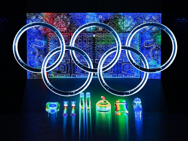 2022 Beijing Olympics Gate of China - Special effects make appear the Olympic rings in front of a spectacular entrance, representing the 'Gate of China' and 'Window of China', via which the athletes are making their way into Beijing's 'Bird's Nest' stadium, at the start of parade of nations during the Opening ceremony of the Winter Olympics February 4, 2022. <br />
The 'Gate of China' symbolizes that China opens its doors to welcome the world to the Olympic Winter Games. Through the''Window of China'  is showcased the magnificent scenery, which expresses the idea of 'seeing China through an open window'. - , 2022, Beijing, Olympics, gate, gates, China, show, shows, effects, effect, Olympic, rings, ring, spectacular, entrance, window, window, the, athletes, bird, nest, stadium, stadiums, parade, nations, ceremony, winter, February, doors, door, world, magnificent, scenery - Special effects make appear the Olympic rings in front of a spectacular entrance, representing the 'Gate of China' and 'Window of China', via which the athletes are making their way into Beijing's 'Bird's Nest' stadium, at the start of parade of nations during the Opening ceremony of the Winter Olympics February 4, 2022. <br />
The 'Gate of China' symbolizes that China opens its doors to welcome the world to the Olympic Winter Games. Through the''Window of China'  is showcased the magnificent scenery, which expresses the idea of 'seeing China through an open window'. Solve free online 2022 Beijing Olympics Gate of China puzzle games or send 2022 Beijing Olympics Gate of China puzzle game greeting ecards  from puzzles-games.eu.. 2022 Beijing Olympics Gate of China puzzle, puzzles, puzzles games, puzzles-games.eu, puzzle games, online puzzle games, free puzzle games, free online puzzle games, 2022 Beijing Olympics Gate of China free puzzle game, 2022 Beijing Olympics Gate of China online puzzle game, jigsaw puzzles, 2022 Beijing Olympics Gate of China jigsaw puzzle, jigsaw puzzle games, jigsaw puzzles games, 2022 Beijing Olympics Gate of China puzzle game ecard, puzzles games ecards, 2022 Beijing Olympics Gate of China puzzle game greeting ecard