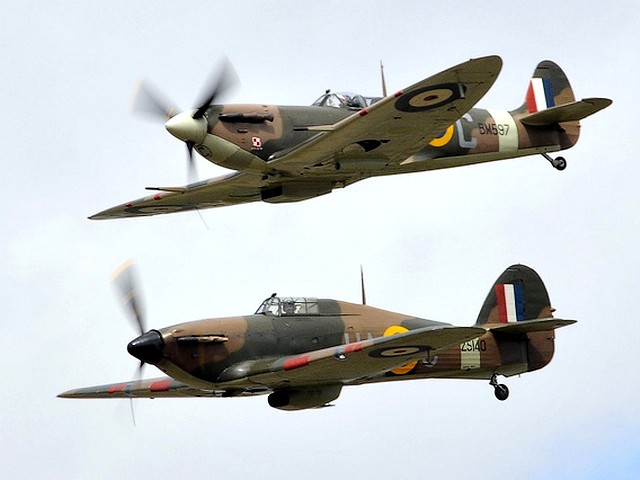 Air Show Supermarine Spitfire and Hawker Hurricane in Flight at RIAT Fairford Gloucestershire England - Supermarine Spitfire Vb BM597 and Hawker Hurricane Mk 11a Z5149 (G-HURI) in flight at the air show 'Royal International Air Tattoo' (RIAT) in Fairford, Gloucestershire, England (2010). In September 2005, the restored Spitfire BM597 and Hurricane Z5149 flew from Duxford back to the Mediterranean island Malta, where during the Second World War, they participated in the battle, known as one of the most decisive turning points of the war. - , air, show, shows, Supermarine, Spitfire, Hawker, Hurricane, flight, flights, RIAT, Fairford, Gloucestershire, England, flight, flights, event, events, entertainment, entertainments, place, places, travel, travels, tour, tours, BM597, Z5149, Royal, International, Tattoo, 2010, September, 2005, Duxford, Mediterranean, island, islands, Malta, Second, World, War, wars, battle, battles, decisive, turning, points, point - Supermarine Spitfire Vb BM597 and Hawker Hurricane Mk 11a Z5149 (G-HURI) in flight at the air show 'Royal International Air Tattoo' (RIAT) in Fairford, Gloucestershire, England (2010). In September 2005, the restored Spitfire BM597 and Hurricane Z5149 flew from Duxford back to the Mediterranean island Malta, where during the Second World War, they participated in the battle, known as one of the most decisive turning points of the war. Solve free online Air Show Supermarine Spitfire and Hawker Hurricane in Flight at RIAT Fairford Gloucestershire England puzzle games or send Air Show Supermarine Spitfire and Hawker Hurricane in Flight at RIAT Fairford Gloucestershire England puzzle game greeting ecards  from puzzles-games.eu.. Air Show Supermarine Spitfire and Hawker Hurricane in Flight at RIAT Fairford Gloucestershire England puzzle, puzzles, puzzles games, puzzles-games.eu, puzzle games, online puzzle games, free puzzle games, free online puzzle games, Air Show Supermarine Spitfire and Hawker Hurricane in Flight at RIAT Fairford Gloucestershire England free puzzle game, Air Show Supermarine Spitfire and Hawker Hurricane in Flight at RIAT Fairford Gloucestershire England online puzzle game, jigsaw puzzles, Air Show Supermarine Spitfire and Hawker Hurricane in Flight at RIAT Fairford Gloucestershire England jigsaw puzzle, jigsaw puzzle games, jigsaw puzzles games, Air Show Supermarine Spitfire and Hawker Hurricane in Flight at RIAT Fairford Gloucestershire England puzzle game ecard, puzzles games ecards, Air Show Supermarine Spitfire and Hawker Hurricane in Flight at RIAT Fairford Gloucestershire England puzzle game greeting ecard