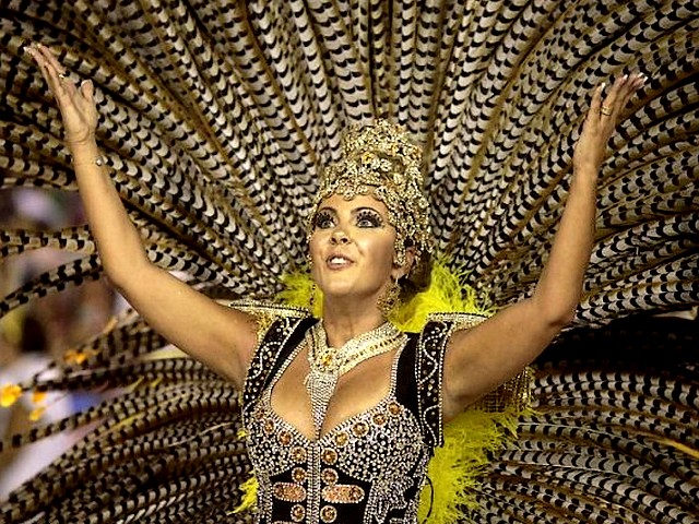 Rio Carnival Brazil 2011 Participant on Sambadrome Parade - A reveller from the samba school 'Unidos da Tijuca' on the 'Sambadrome', the built area for parade competition, which is held each year in downtown Rio de Janeiro, Brazil (March 2011). - , Rio, carnival, carnivals, 2011, Brazil, participant, participants, Sambadrome, parade, parades, show, shows, place, places, celebrations, celebration, festival, festivals, feast, amusement, amusements, holidays, holiday, places, place, travel, travels, tour, tours, trips, trip, samba, school, schools, Unidos, Tijuca, area, areas, competition, competitions, each, year, years, downtown, downtowns, Janeiro, March - A reveller from the samba school 'Unidos da Tijuca' on the 'Sambadrome', the built area for parade competition, which is held each year in downtown Rio de Janeiro, Brazil (March 2011). Подреждайте безплатни онлайн Rio Carnival Brazil 2011 Participant on Sambadrome Parade пъзел игри или изпратете Rio Carnival Brazil 2011 Participant on Sambadrome Parade пъзел игра поздравителна картичка  от puzzles-games.eu.. Rio Carnival Brazil 2011 Participant on Sambadrome Parade пъзел, пъзели, пъзели игри, puzzles-games.eu, пъзел игри, online пъзел игри, free пъзел игри, free online пъзел игри, Rio Carnival Brazil 2011 Participant on Sambadrome Parade free пъзел игра, Rio Carnival Brazil 2011 Participant on Sambadrome Parade online пъзел игра, jigsaw puzzles, Rio Carnival Brazil 2011 Participant on Sambadrome Parade jigsaw puzzle, jigsaw puzzle games, jigsaw puzzles games, Rio Carnival Brazil 2011 Participant on Sambadrome Parade пъзел игра картичка, пъзели игри картички, Rio Carnival Brazil 2011 Participant on Sambadrome Parade пъзел игра поздравителна картичка