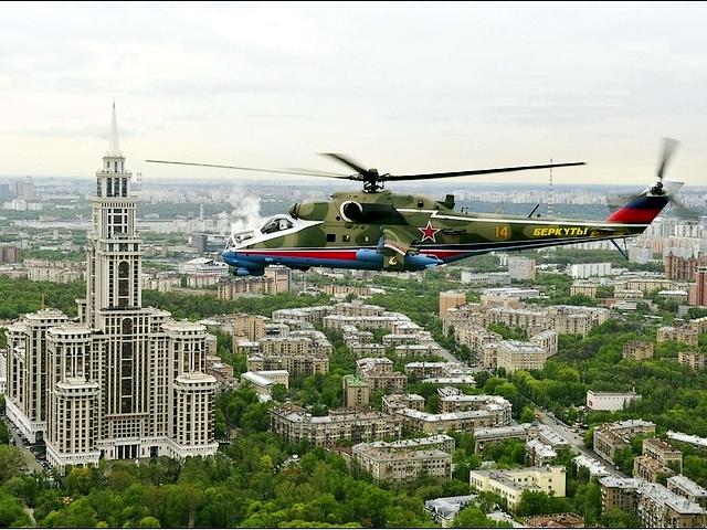 Victory Day in Moscow MI-24 flies over the City - A military helicopter MI-24 of the Berkuty flies over the city during the Victory Day parade in Moscow (May 9, 2010). - , Victory, Day, Moscow, MI-24, city, cities, show, shows, place, places, performance, performances, military, helicopter, helicopters, Berkuty, parade, parades, May, 2010 - A military helicopter MI-24 of the Berkuty flies over the city during the Victory Day parade in Moscow (May 9, 2010). Подреждайте безплатни онлайн Victory Day in Moscow MI-24 flies over the City пъзел игри или изпратете Victory Day in Moscow MI-24 flies over the City пъзел игра поздравителна картичка  от puzzles-games.eu.. Victory Day in Moscow MI-24 flies over the City пъзел, пъзели, пъзели игри, puzzles-games.eu, пъзел игри, online пъзел игри, free пъзел игри, free online пъзел игри, Victory Day in Moscow MI-24 flies over the City free пъзел игра, Victory Day in Moscow MI-24 flies over the City online пъзел игра, jigsaw puzzles, Victory Day in Moscow MI-24 flies over the City jigsaw puzzle, jigsaw puzzle games, jigsaw puzzles games, Victory Day in Moscow MI-24 flies over the City пъзел игра картичка, пъзели игри картички, Victory Day in Moscow MI-24 flies over the City пъзел игра поздравителна картичка