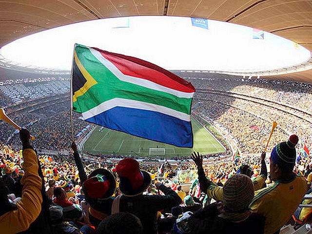 World Cup 2010 Fans hold up a Flag of South Africa - Fans hold up a flag of South Africa at the Soccer City stadium before the opening match between South Africa and Mexico of the FIFA World Cup 2010 in Johannesburg (June 11). - , World, Cup, 2010, fans, fan, flag, flags, South, Africa, show, shows, performance, performances, sport, sports, tournament, tournaments, qualification, qualifications, ceremony, ceremonies, match, matches, Soccer, City, stadium, stadiums, Opening, FIFA, Mexico, Johannesburg - Fans hold up a flag of South Africa at the Soccer City stadium before the opening match between South Africa and Mexico of the FIFA World Cup 2010 in Johannesburg (June 11). Lösen Sie kostenlose World Cup 2010 Fans hold up a Flag of South Africa Online Puzzle Spiele oder senden Sie World Cup 2010 Fans hold up a Flag of South Africa Puzzle Spiel Gruß ecards  from puzzles-games.eu.. World Cup 2010 Fans hold up a Flag of South Africa puzzle, Rätsel, puzzles, Puzzle Spiele, puzzles-games.eu, puzzle games, Online Puzzle Spiele, kostenlose Puzzle Spiele, kostenlose Online Puzzle Spiele, World Cup 2010 Fans hold up a Flag of South Africa kostenlose Puzzle Spiel, World Cup 2010 Fans hold up a Flag of South Africa Online Puzzle Spiel, jigsaw puzzles, World Cup 2010 Fans hold up a Flag of South Africa jigsaw puzzle, jigsaw puzzle games, jigsaw puzzles games, World Cup 2010 Fans hold up a Flag of South Africa Puzzle Spiel ecard, Puzzles Spiele ecards, World Cup 2010 Fans hold up a Flag of South Africa Puzzle Spiel Gruß ecards