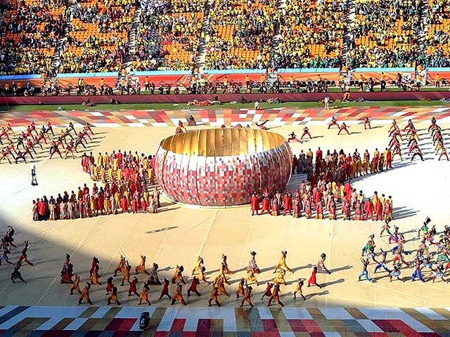 World Cup 2010 a Performance - A choreography performance around the replica of the 'Soccer City' stadium during the Opening Ceremony of the FIFA World Cup 2010 in Johannesburg, South Africa (June 11). - , World, Cup, 2010, performance, performances, show, shows, sport, sports, tournament, tournaments, qualification, qualifications, ceremony, ceremonies, match, matches, choreography, choreographies, replica, replicas, Soccer, City, stadium, stadiums, Opening, FIFA, Johannesburg, South, Africa - A choreography performance around the replica of the 'Soccer City' stadium during the Opening Ceremony of the FIFA World Cup 2010 in Johannesburg, South Africa (June 11). Подреждайте безплатни онлайн World Cup 2010 a Performance пъзел игри или изпратете World Cup 2010 a Performance пъзел игра поздравителна картичка  от puzzles-games.eu.. World Cup 2010 a Performance пъзел, пъзели, пъзели игри, puzzles-games.eu, пъзел игри, online пъзел игри, free пъзел игри, free online пъзел игри, World Cup 2010 a Performance free пъзел игра, World Cup 2010 a Performance online пъзел игра, jigsaw puzzles, World Cup 2010 a Performance jigsaw puzzle, jigsaw puzzle games, jigsaw puzzles games, World Cup 2010 a Performance пъзел игра картичка, пъзели игри картички, World Cup 2010 a Performance пъзел игра поздравителна картичка