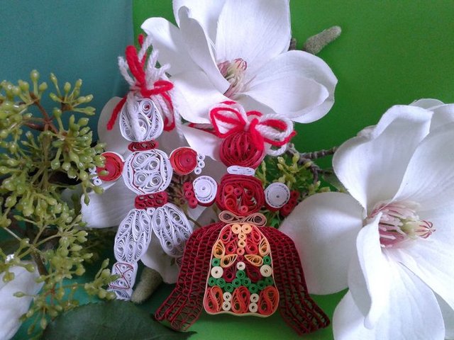 Martisor Moldavian Symbol of Spring - This martisor on Yulan magnolia is a traditional Moldavian symbol of spring, featuring two white and red  figurines of little boy and girl, handmade by use of Quilling technique from twisted narrow strips of paper.<br />
Martisor is popular in Eastern Europe, which is given on the first day of spring. According to tradition, the jewelry is worn on clothes throughout March, and when the trees begin to bloom, they are hung on the branches. - , martisor, Moldavian, symbol, symbols, spring, holiday, holidays, art, arts, Yulan, magnolia, traditional, white, red, figurines, boy, girl, handmade, Quilling, technique, twisted, narrow, strips, paper, Eastern, Europe, first, tradition, jewelry, clothes, March, trees, begin, branches - This martisor on Yulan magnolia is a traditional Moldavian symbol of spring, featuring two white and red  figurines of little boy and girl, handmade by use of Quilling technique from twisted narrow strips of paper.<br />
Martisor is popular in Eastern Europe, which is given on the first day of spring. According to tradition, the jewelry is worn on clothes throughout March, and when the trees begin to bloom, they are hung on the branches. Solve free online Martisor Moldavian Symbol of Spring puzzle games or send Martisor Moldavian Symbol of Spring puzzle game greeting ecards  from puzzles-games.eu.. Martisor Moldavian Symbol of Spring puzzle, puzzles, puzzles games, puzzles-games.eu, puzzle games, online puzzle games, free puzzle games, free online puzzle games, Martisor Moldavian Symbol of Spring free puzzle game, Martisor Moldavian Symbol of Spring online puzzle game, jigsaw puzzles, Martisor Moldavian Symbol of Spring jigsaw puzzle, jigsaw puzzle games, jigsaw puzzles games, Martisor Moldavian Symbol of Spring puzzle game ecard, puzzles games ecards, Martisor Moldavian Symbol of Spring puzzle game greeting ecard