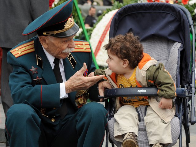Victory Day Veteran of WWII in Yerevan Armenia - A veteran of WWII speaks with a little child in the Armenian capital Yerevan, during the celebrations of Victory Day. <br />
As the other former Soviet republics, Armenia commemorates on May 9 the victory of the Red Army over the Nazi forces in the Second World War, known as the Great Patriotic War. The holiday was officially recognized by Armenia since the independence in 1990. - , Victory, Day, days, veteran, veterans, WWII, Yerevan, Armenia, holiday, holidays, little, child, children, Armenian, capital, capitals, celebrations, celebration, former, Soviet, republics, republic, Red, Army, armies, Nazi, forces, force, Second, World, War, wars, Great, Patriotic, independence, 1990 - A veteran of WWII speaks with a little child in the Armenian capital Yerevan, during the celebrations of Victory Day. <br />
As the other former Soviet republics, Armenia commemorates on May 9 the victory of the Red Army over the Nazi forces in the Second World War, known as the Great Patriotic War. The holiday was officially recognized by Armenia since the independence in 1990. Solve free online Victory Day Veteran of WWII in Yerevan Armenia puzzle games or send Victory Day Veteran of WWII in Yerevan Armenia puzzle game greeting ecards  from puzzles-games.eu.. Victory Day Veteran of WWII in Yerevan Armenia puzzle, puzzles, puzzles games, puzzles-games.eu, puzzle games, online puzzle games, free puzzle games, free online puzzle games, Victory Day Veteran of WWII in Yerevan Armenia free puzzle game, Victory Day Veteran of WWII in Yerevan Armenia online puzzle game, jigsaw puzzles, Victory Day Veteran of WWII in Yerevan Armenia jigsaw puzzle, jigsaw puzzle games, jigsaw puzzles games, Victory Day Veteran of WWII in Yerevan Armenia puzzle game ecard, puzzles games ecards, Victory Day Veteran of WWII in Yerevan Armenia puzzle game greeting ecard