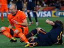World Cup 2010 Champion Carles Puyol tackles Arjen Robben