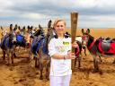 2012 London Olympics Torchbearer Starr Halley with Olympic Flame in Skegness England