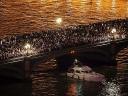 Westminster Bridge over River Thames with Revellers in London England